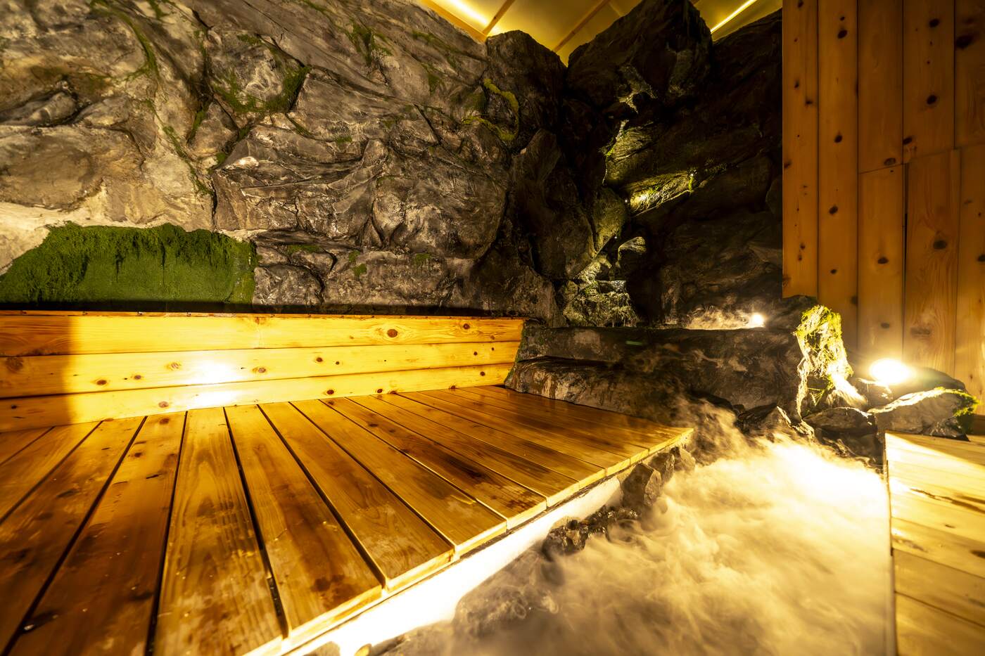 Cedar deck beside the steaming rock bath