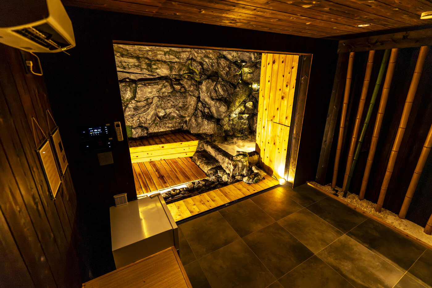 Anteroom looking into the open-air stone bath